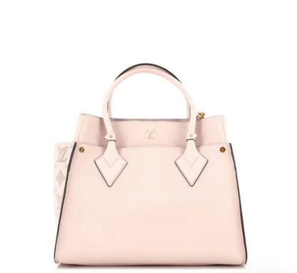 Louis Vuitton
On My Side Tote Mahina Leather MM