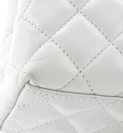 Chanel
Kelly Top Handle Shopping Bag Quilted Shiny Aged Calfskin Mini