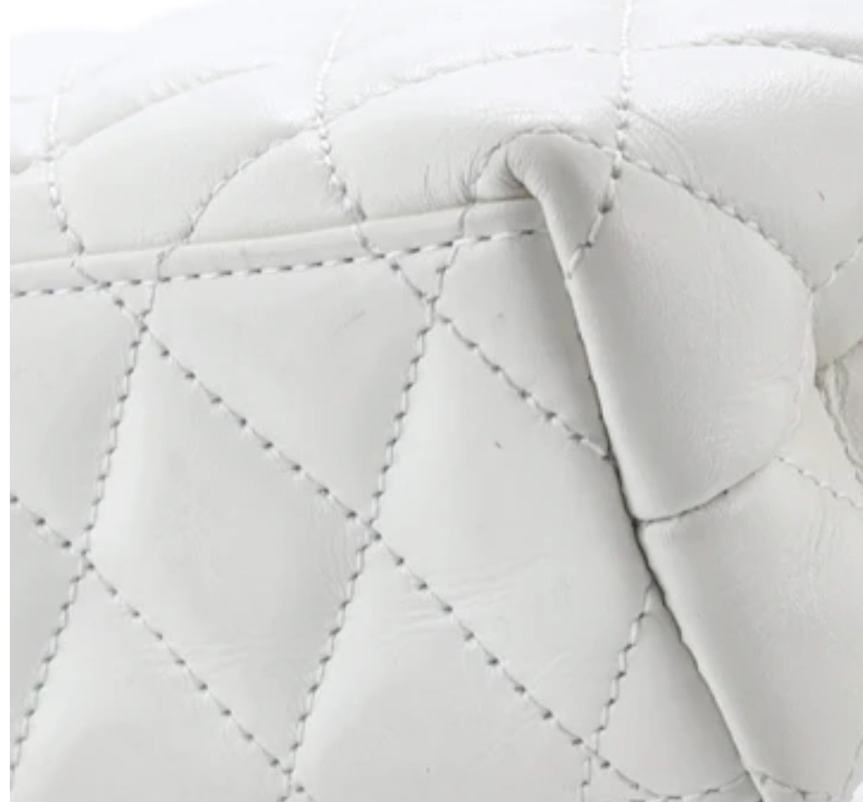 Chanel
Kelly Top Handle Shopping Bag Quilted Shiny Aged Calfskin Mini