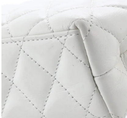 Chanel
Kelly Top Handle Shopping Bag Quilted Shiny Aged Calfskin Mini