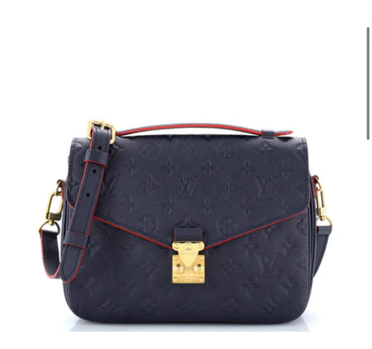 Louis Vuitton
Pochette Metis Monogram Empreinte Leather