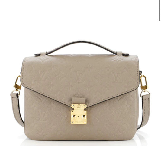 Louis Vuitton
Pochette Metis Monogram Empreinte Leather