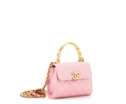 Chanel
Coco Enamel Top Handle Flap Bag Quilted Lambskin Small