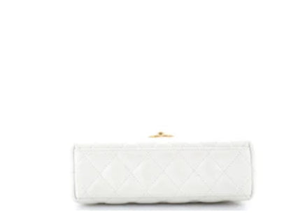 Chanel
Kelly Top Handle Shopping Bag Quilted Shiny Aged Calfskin Mini