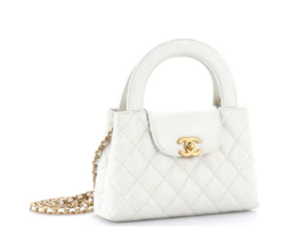 Chanel
Kelly Top Handle Shopping Bag Quilted Shiny Aged Calfskin Mini