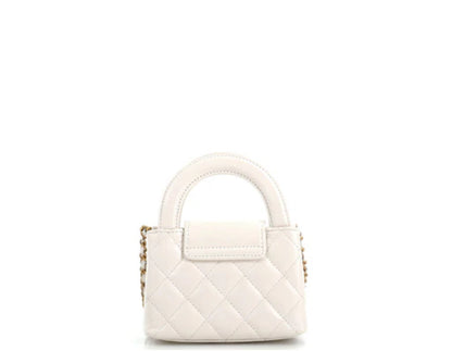 Chanel
Kelly Top Handle Clutch with Chain Quilted Shiny Aged Calfskin