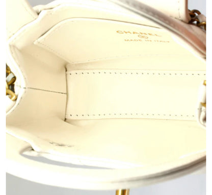 Chanel
Kelly Top Handle Clutch with Chain Quilted Shiny Aged Calfskin
